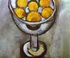 A vase with Oranges.